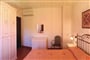 Ložnice v apartmánu BILO a TRILO, Punta Marana, Sardinie