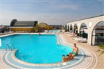 Caorle - Apartmány Colombo, moderní rezidenční objekt s bazény na střeše, plážový servis v ceně