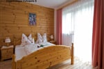 Pokoj s manželskou postelí a balkonem kat. B