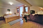 Manželská postel apartmánu Habicht