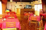 Restaurace s barem, krbem a terasou