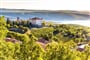 View Of Aiguines Village And Renaissance-style Chateau Overlooking Lac de Sainte Croix Lake-Alpes de Haute Provence,France