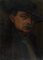Muž s okuliaroch