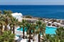 Hotel Kamari Beach Santorini: fotografie vybavení exteriérů a interiérů ubytování.
