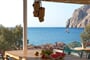 Hotel Kamari Beach Santorini: fotografie vybavení exteriérů a interiérů ubytování.