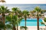 Hotel Kamari Beach Santorini: fotografie vybavení exteriérů a interiérů ubytování.