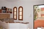 Apartmánový dům Ekavi: fotografie vybavení exteriérů a interiérů ubytování.