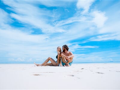 Young couple on an empty beach