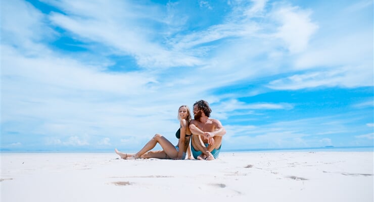 Young couple on an empty beach