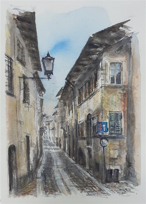 Ulička v San Michele all'Adige, Itálie