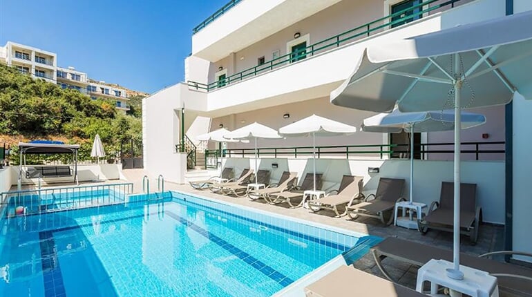 Aparthotel Manos Palace: fotografie vybavení exteriérů a interiérů ubytování.