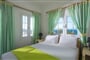 Apartmánový dům Elena's Beach Garden: fotografie vybavení exteriérů a interiérů ubytování.