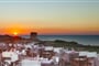 Restaurace s výhledem, Isola Rossa, Sardinie
