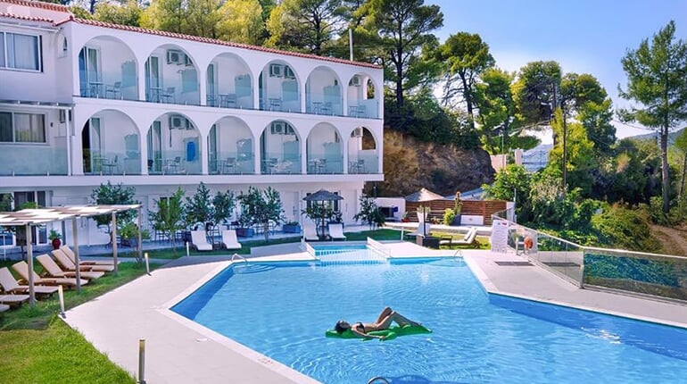 Hotel Punta: fotografie vybavení exteriérů a interiérů ubytování.