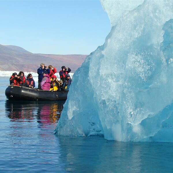 Zodiac cruising among massive icebergs Christoph Gouraud