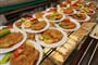 homemade-foods-served-big-trays-restaurant-sale