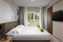 Residence-Garden-Istra-Plava-Laguna_2022_Accommodation-units_Superior-Room-with-balcony-pool-side_Family_F4BXD-1024x683