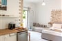 hotelnefeli-suites-bedroom-kitchen-605x465