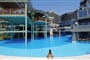 Hotel Limak Lara Deluxe & Resort: fotografie vybavení exteriérů a interiérů ubytování.
