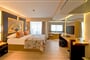 Hotel Limak Lara Deluxe & Resort: fotografie vybavení exteriérů a interiérů ubytování.