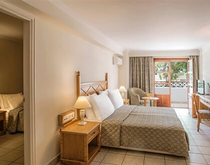 Hotel Mitsis Petit Palais: fotografie vybavení exteriérů a interiérů ubytování.