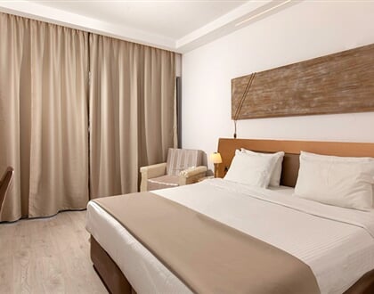 Hotel Kolymbia Bay Art: fotografie vybavení exteriérů a interiérů ubytování.