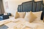 Hotel Parrotel Beach Resort: fotografie vybavení exteriérů a interiérů ubytování.