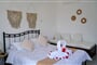 Aparthotel Taxiarchis: fotografie vybavení exteriérů a interiérů ubytování.