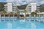 dosinia_luxury_resort_main_building_front_view_main_pool-e1725612174757
