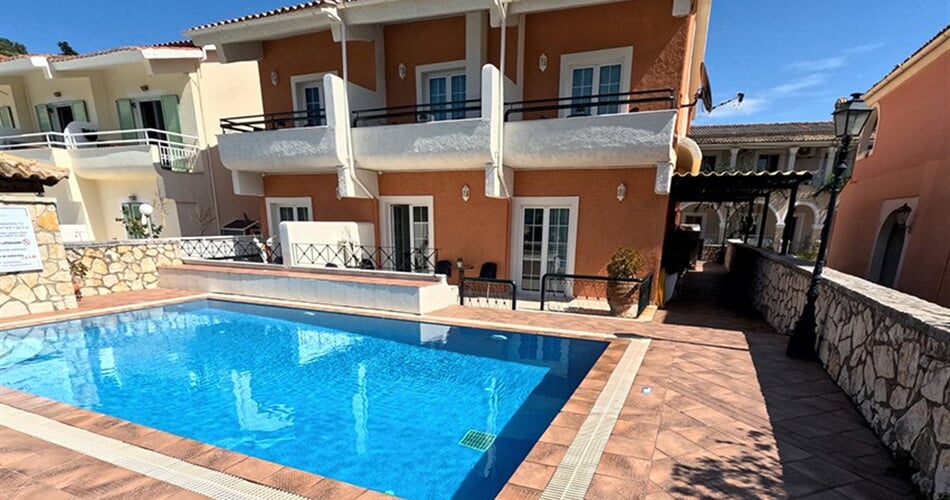 Studia Villa Nelli: fotografie vybavení exteriérů a interiérů ubytování.