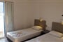 Hotel Homer's Inn: fotografie vybavení exteriérů a interiérů ubytování.