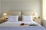 Hotel Costa Rossa Boutique: fotografie vybavení exteriérů a interiérů ubytování.