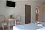 Hotel Costa Rossa Boutique: fotografie vybavení exteriérů a interiérů ubytování.