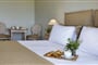 Hotel Costa Rossa Boutique: fotografie vybavení exteriérů a interiérů ubytování.