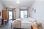 Apartmánový dům Aridas at the Beach: fotografie vybavení exteriérů a interiérů ubytování.