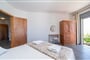 Apartmánový dům Aridas at the Beach: fotografie vybavení exteriérů a interiérů ubytování.