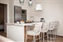 Apartmánový dům Asteria: fotografie vybavení exteriérů a interiérů ubytování.