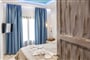 Apartmánový dům Theoxenia: fotografie vybavení exteriérů a interiérů ubytování.
