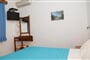 Apartmánový dům Perigiali: fotografie vybavení exteriérů a interiérů ubytování.