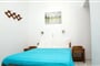 Apartmánový dům Perigiali: fotografie vybavení exteriérů a interiérů ubytování.