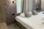 Apartmánový dům Kipos: fotografie vybavení exteriérů a interiérů ubytování.