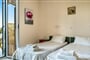 Apartmánový dům Anemona: fotografie vybavení exteriérů a interiérů ubytování.
