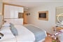 Hotel Mediteran: fotografie vybavení exteriérů a interiérů ubytování.