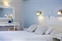 Hotel Astra Village: fotografie vybavení exteriérů a interiérů ubytování.