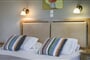 Hotel Astra Village: fotografie vybavení exteriérů a interiérů ubytování.