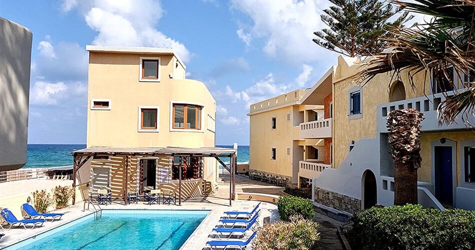 Aparthotel Niros Beachfront: fotografie vybavení exteriérů a interiérů ubytování.