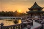 sunset with Chinese building scenes_shutterstock_3588448885
