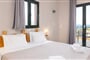 Aparthotel Nisea: fotografie vybavení exteriérů a interiérů ubytování.