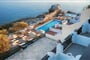 Aparthotel Cavos Bay: fotografie vybavení exteriérů a interiérů ubytování.