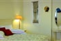 Hotel Omirikon: fotografie vybavení exteriérů a interiérů ubytování.